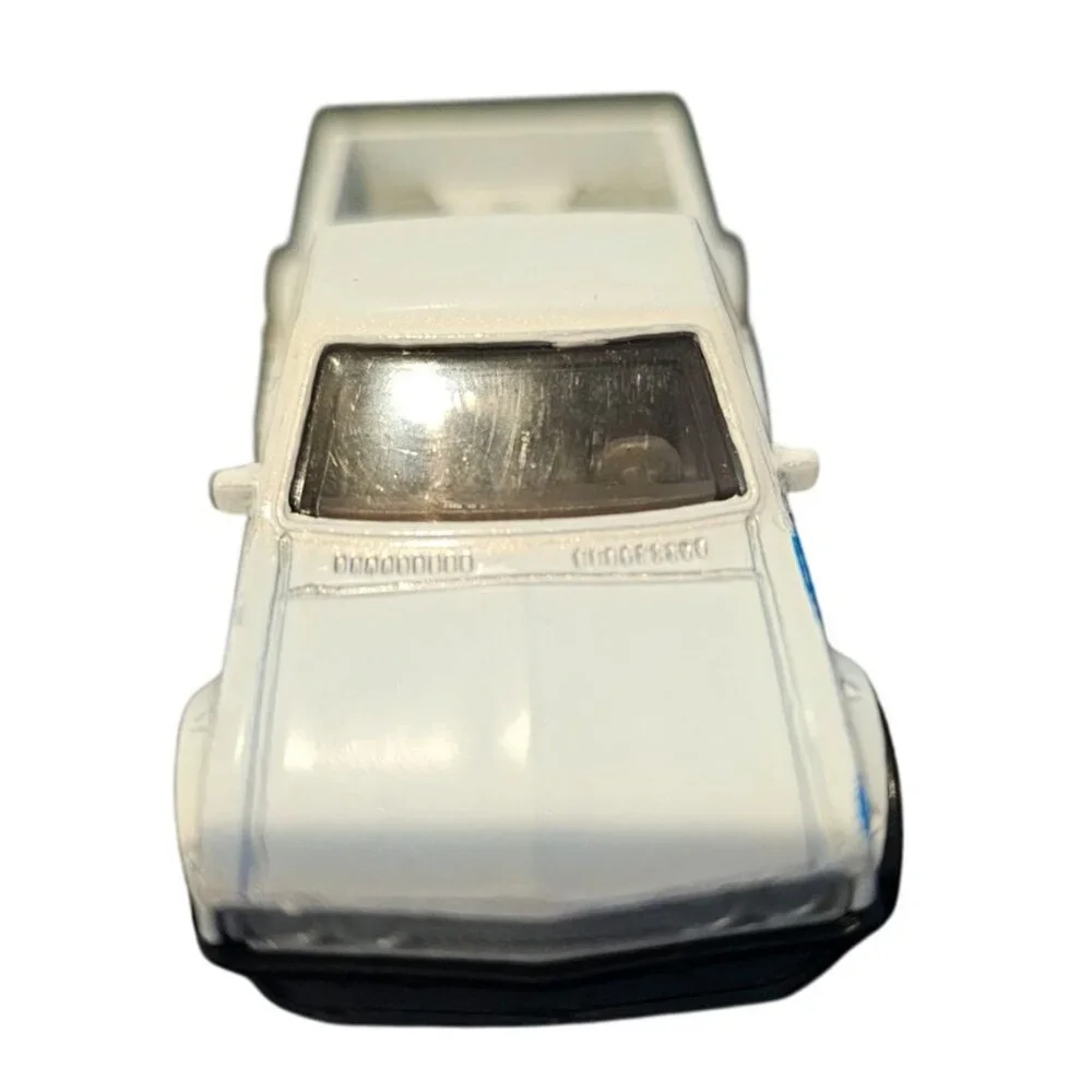 Hot Wheels Datsun 620 Die-Cast Pickup Truck Toy Model White Racing Stripes 2013